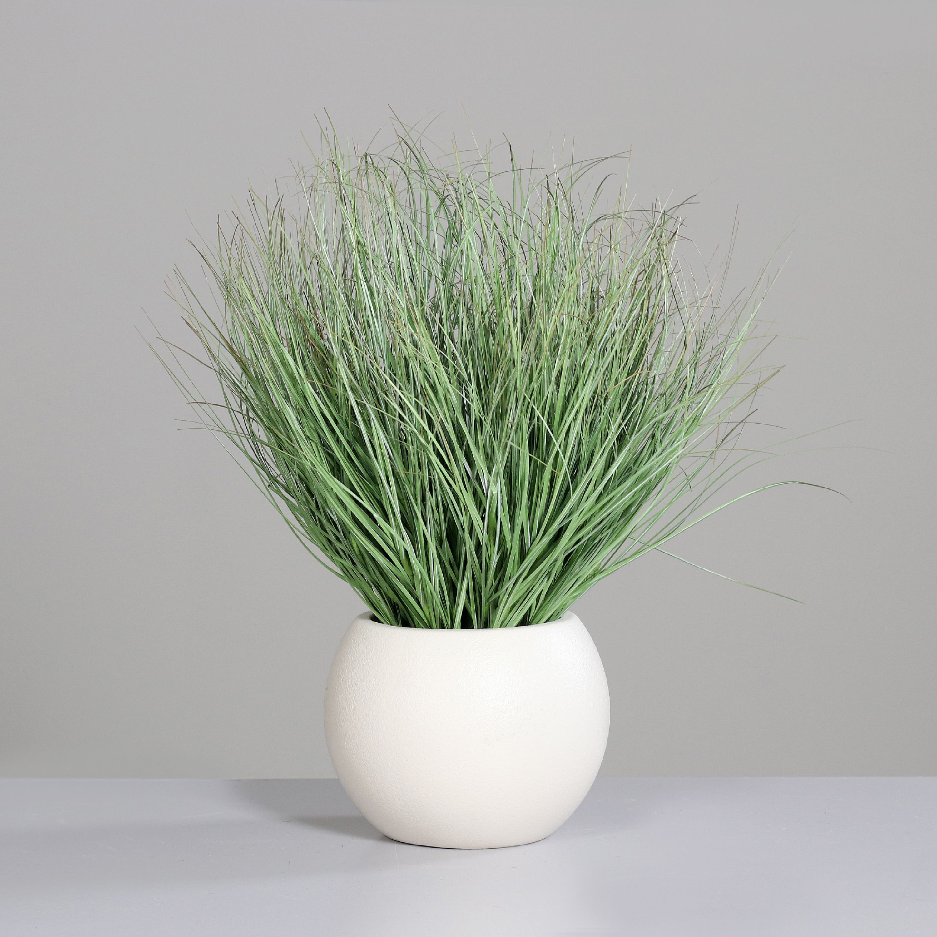 Kunstpflanze Gras
