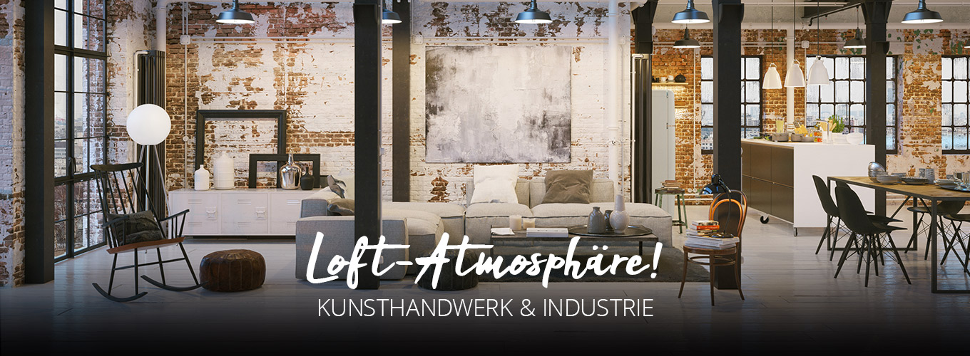 Loft-Atmosphäre - Kunsthandwerk & Industrie - Loft Ambiente mit gob verputzter Backstein-Mauer, anthrazitfarbenen Stahlstützen, die den Raum in Wohn- Ess- und Küchenbereich gliedern