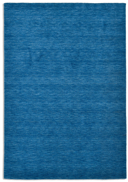 Teppich HOLI in blau aus Schurwolle