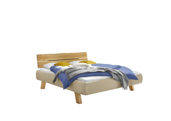 Massivholzbett Liddy in beige aus Stoff